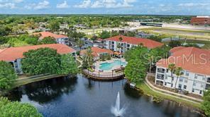 Photo of 2549 Maitland Crossing Way #306, Orlando, FL 32810 (MLS # O6410030)
