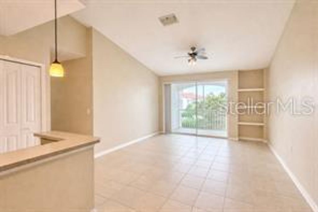 Photo of 2549 Maitland Crossing Way #306, Orlando, FL 32810 (MLS # O6410030)