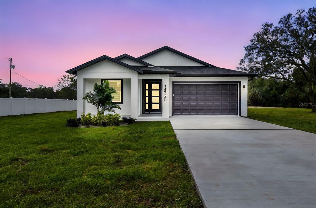 Photo of 14726 Elmont Ave, Spring Hill, FL 34610 (MLS # TB8433774)