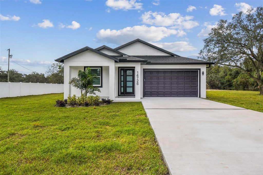 Photo of 14726 Elmont Ave, Spring Hill, FL 34610 (MLS # TB8433774)