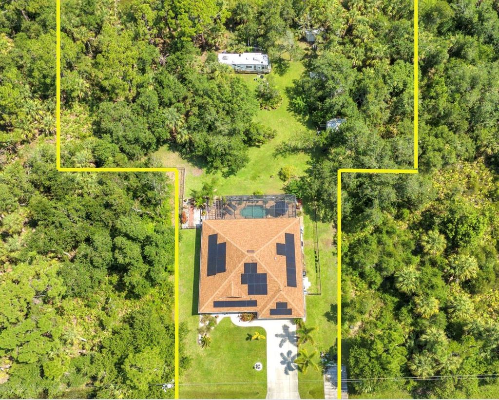 Photo of 14136 Hughes Avenue, Port Charlotte, FL 33953 (MLS # D6143288)
