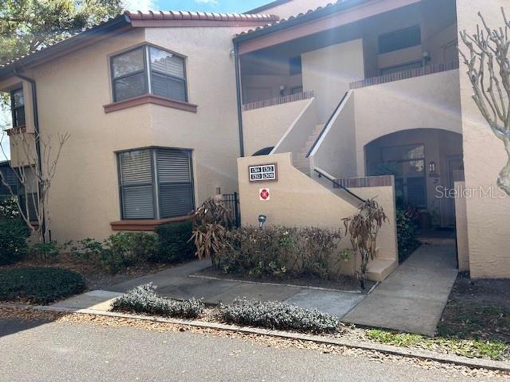 Photo of 1308 Lake Willisara Circle #12, Orlando, FL 32806 (MLS # O6388814)