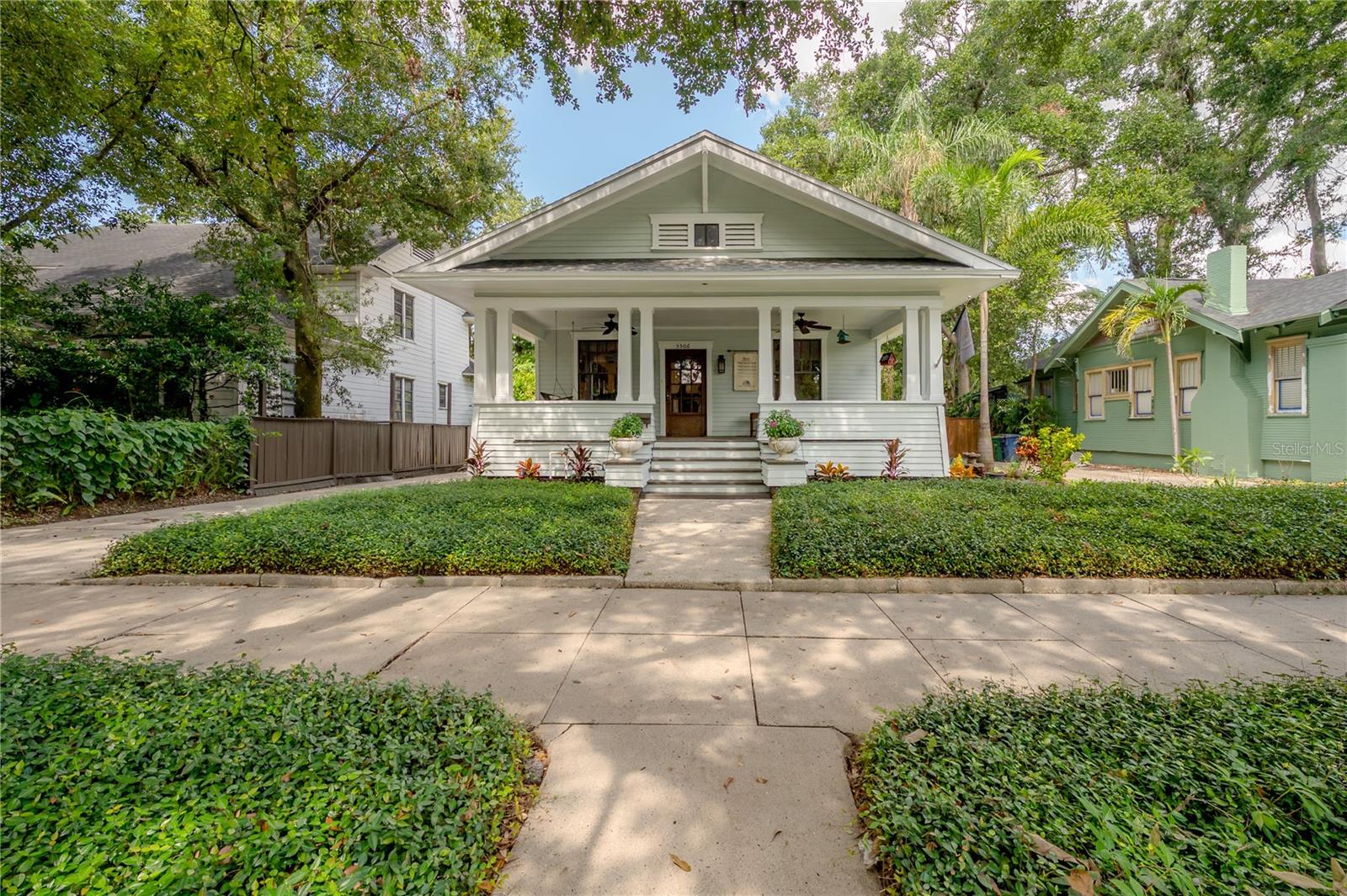 Step into a piece of Tampa history with this stunning 1918 bungalow located in the highly sought-after neighborhood of Old Seminole Heights. Rich with character and charm, this home captures the timeless beauty of early 20th-century craftsmanship while offering the space and updates today’s homeowners crave.
From the moment you arrive, the welcoming front porch—complete with original columns and period details—sets the tone for what’s inside. As you enter, you’ll be greeted by expansive windows that allow natural light to pour in, showcasing the original hardwood floors that flow throughout the home. Every detail has been thoughtfully preserved, from the intricate wood trim framing the doors and windows to the beautiful wood detailing along the ceiling lines—creating a sense of warmth and history in every room.
The spacious living room centers around a cozy wood-burning fireplace, making it the perfect gathering space during cooler evenings or quiet Sunday mornings with a good book. Just beyond, the formal dining area leads into a large, chef-inspired kitchen offering plenty of cabinetry, generous counter space, and a charming nook that’s ideal for breakfast, coffee, or catching up on emails. Whether you're entertaining or enjoying a quiet evening in, this kitchen offers the functionality and space to do it all.
One of the true highlights of this home is the oversized primary suite—a rare find in a historic bungalow. This serene retreat features a massive layout, a luxurious en suite bathroom, and an impressively large walk-in closet, offering comfort and practicality without sacrificing character. The two guest bedrooms are equally spacious and share a beautifully updated bathroom that features a vintage clawfoot tub—perfect for soaking after a long day and a nod to the home’s original roots.
Step outside to find your own private oasis. The large backyard is a lush retreat with mature landscaping, a pergola perfect for shaded lounging or outdoor dining, and plenty of room to garden, entertain, or simply enjoy the Florida sunshine. A sprinkler system has been installed for easy maintenance, and a detached one-car garage offers additional storage, workshop potential, or a place to keep your favorite weekend cruiser.
Located on a picturesque street in Old Seminole Heights, this home puts you just moments from some of Tampa’s most beloved local restaurants, craft breweries, parks, and coffee shops. Enjoy the walkable lifestyle, tight-knit community, and historic charm that make this neighborhood so incredibly special.
If you’ve been searching for a home that blends the best of old-world charm with modern comfort—this is the one. Welcome Home!