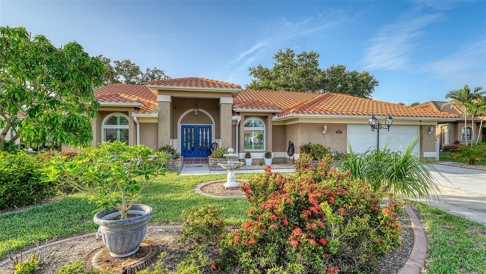 All about the details in this updated house that make it the best choice for your next home. Whether it's a 2nd home or full-time residence you will enjoy the enhancements these owners have made. Greeted by raised brick planters at the entry provides a lovely way to approach the home. Desirable Englewood Isles sits on the Intracostal Waterway, so you're close to MANASOTA BEACH. This house offers 3 Beds/2 Baths in a desirable split floor plan and a 2 CG close to beaches, shopping and restaurants. Sellers have invested a lot in this house. With a flip of the switch, the GENERATOR will take over when electricity may fail. The IMPACT WINDOWS will give you a sense of security no matter which way the wind may blow. More upgrades have been completed in this ownership, like the newer tile roof, wood cabinetry in kitchen and bathrooms, pull-out drawers for convenience in the Kitchen, wood and tiled flooring and an electric fireplace in the living room.
The outdoor area is magical with a custom brick bar includes a beverage refrigerator, sitting area with A GAS FIREPLACE they are leaving and then the custom brick kitchen with gas burners and a flat top. Ultimate outdoor living. Sitting on the deck overlooking the fountain & Lake Eden for morning coffee or evening beverages watching the sunset and the birds and turtles for entertainment. The pool is heated for year round enjoyment.
Designed and updated with attention to details and entertaining in mind, is your perfect Florida getaway! Just minutes from world-class beaches, shopping, and restaurants, this home offers the ultimate in location and lifestyle.
Inside, enjoy stylish upgrades including warm wood flooring in the living room and dining room, and custom wood cabinetry and convenient pull out drawers. The open layout flows effortlessly to the outdoor deck—an inviting space overlooking the lake and fountain, ideal for gatherings and sunset cocktails. The heated pool, custom built-in outdoor kitchen with gas burners and a flat top for all your culinary wishes. The brick custom bar make it easy to host and enjoy friends and family in a resort-like setting. Electrical appliances are included in the purchase. The oversized driveway and attached garage has plenty of room for parking and storage. There are cabinets in the garage making those projects a little easier to create. There are no CDD fees and your annual HOA expenses are only $375! Much of the furniture is negotiable and the electrical appliances all stay, TV'S, water cooler, Beverage refrigerator, etc.