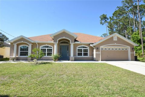 Photo of 11 Burning Ember Lane, Palm Coast, FL 32137 (MLS # FC317994)