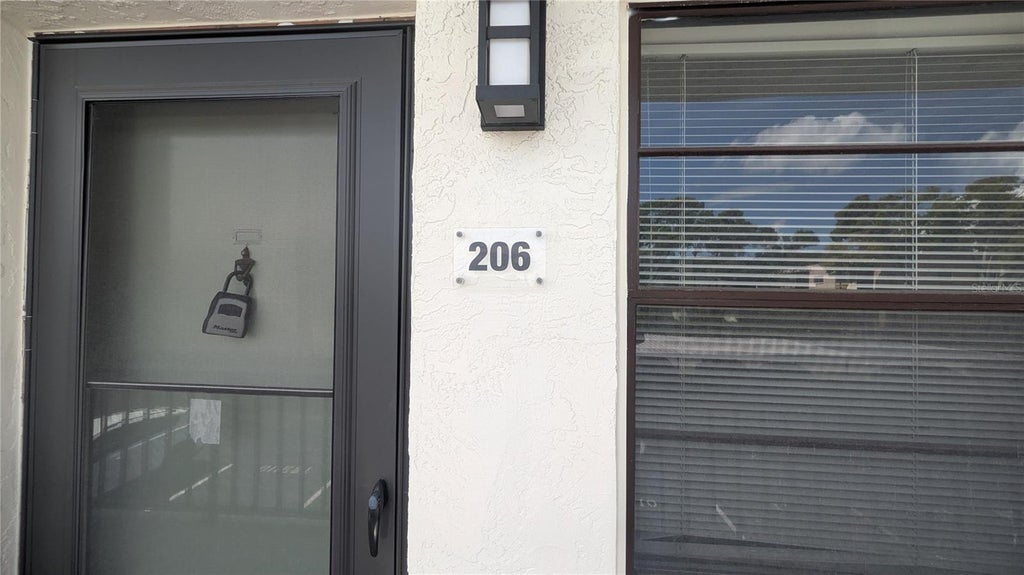 Photo of 5980 Terrace Park Drive N #206, St Petersburg, FL 33709 (MLS # OM732316)