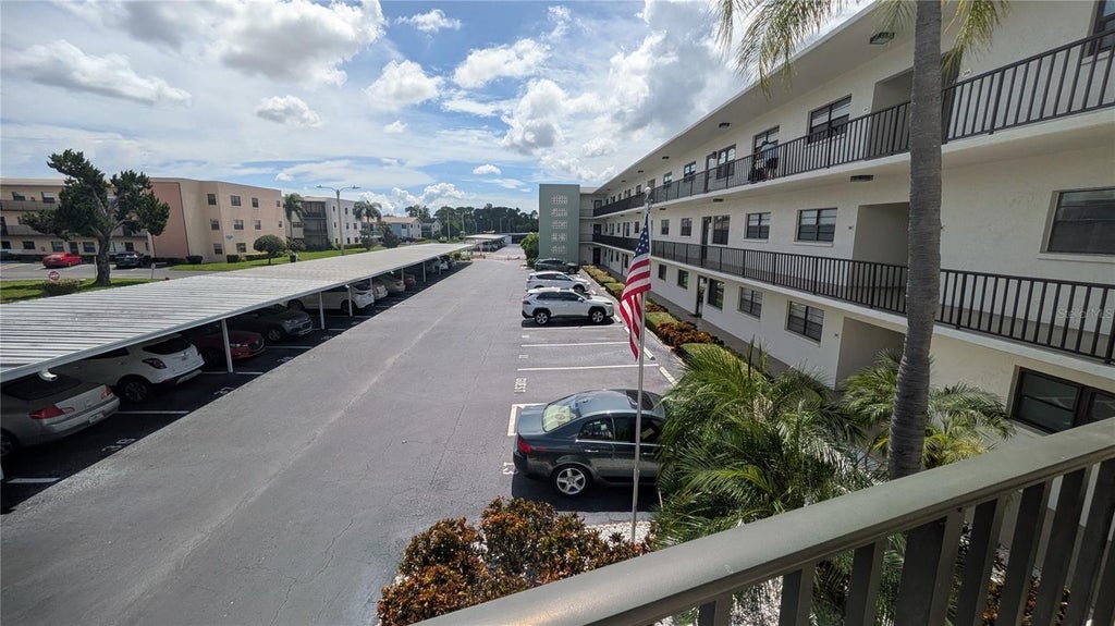 Photo of 5980 Terrace Park Drive N #206, St Petersburg, FL 33709 (MLS # OM732316)