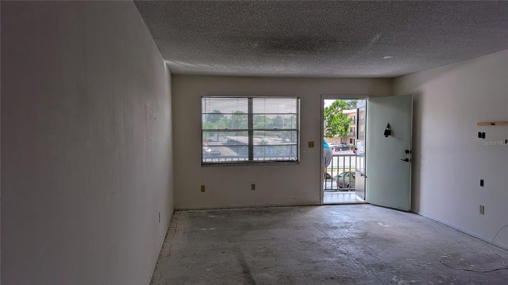Photo of 5980 Terrace Park Drive N #206, St Petersburg, FL 33709 (MLS # OM732316)