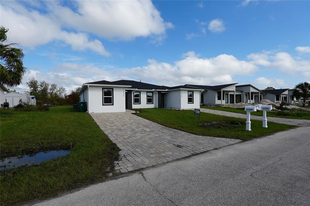 Photo of 17196 Bonnie Avenue, Port Charlotte, FL 33954 (MLS # O6361278)