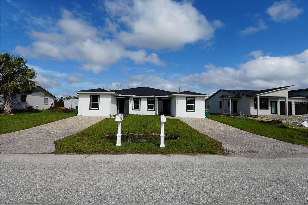 Photo of 17196 Bonnie Avenue, Port Charlotte, FL 33954 (MLS # O6361278)