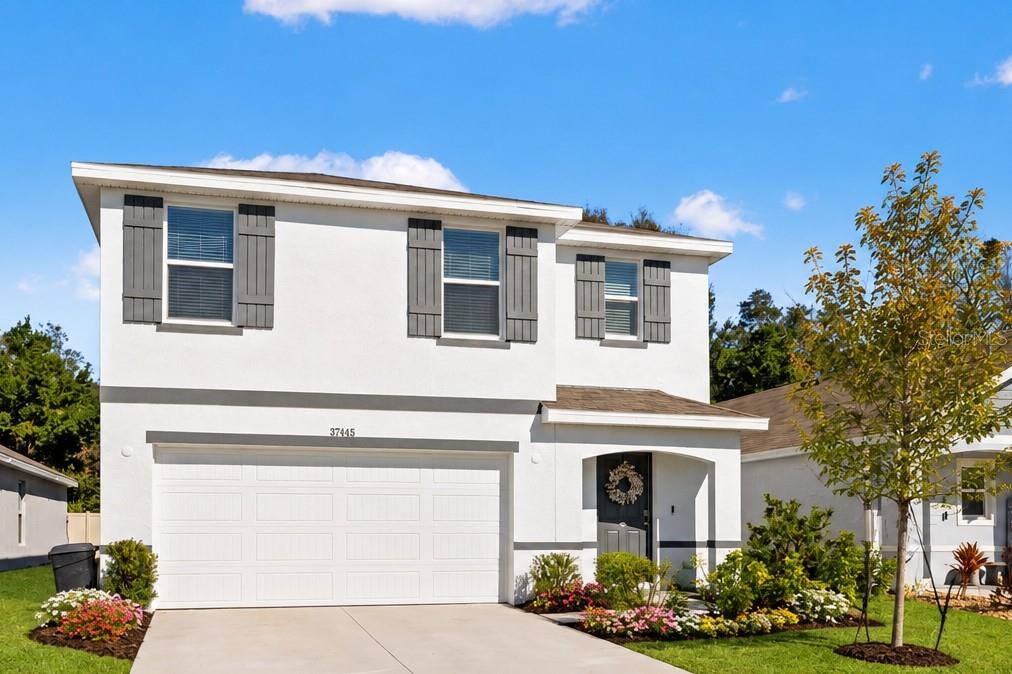Photo of 37445 Sharks Eye Lane, Zephyrhills, FL 33541 (MLS # W7882320)