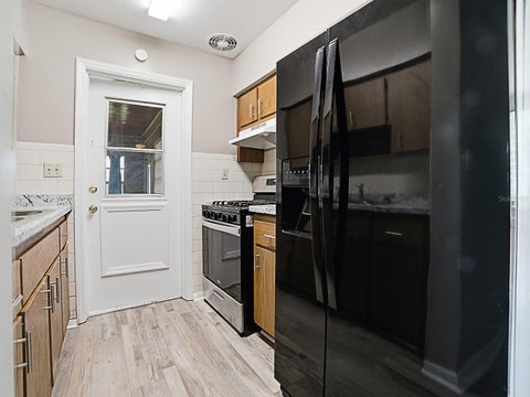 Tiny photo for 2014 Helms Avenue, Leesburg, FL 34748 (MLS # O6437710)