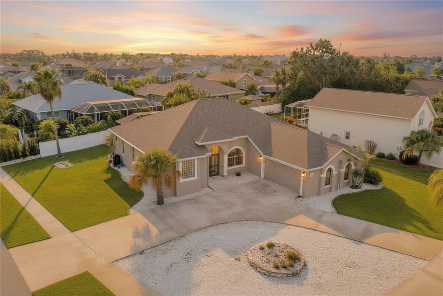 Welcome to your slice of Florida paradise in Golf and Sea Village where there are no CDD Fees! This updated 4-bedroom, 3-bathroom home offers over 2,000 sq. ft. of bright, open living space designed for both comfort and fun. Sitting on an oversized 1/4+ acre corner lot with a circle driveway, there’s plenty of space for family and friends to come and go with ease. Inside, enjoy a fresh boho-inspired design, soaring ceilings, arched windows, and carpet-free living that flows seamlessly from room to room. The updated kitchen with crisp white cabinetry, sleek quartz countertops, and breakfast bar makes everyday meals and weekend gatherings a breeze. Step outside through your fully pocketing sliding glass doors to your personal resort-style retreat, complete with a heated pool, sprawling screened lanai, and covered dining area perfect for BBQs and lazy afternoons. The pool deck even has its own full bathroom for convenience! The split floor plan offers privacy with a spacious primary suite featuring dual walk-in closets, spa-style bath, and direct pool access. Practical touches like a separate laundry room with sink and storage, side-entry garage with built-ins make this home full of function and form! Looking for the ultimate Florida investment property? This Apollo Beach home checks all the boxes for a high-performing vacation rental! With 4 bedrooms, 3 full bathrooms it easily accommodates large families and groups. Guests will love the oversized lot with easy circle-drive parking, open-concept layout, and stylish coastal-inspired finishes. The kitchen is fully updated for cooking at home, while the heated pool, massive screened lanai, and poolside full bathroom create an unbeatable outdoor experience for year-round renters. Nestled in the vibrant waterfront community of Golf and Sea Village in Apollo Beach, you’ll be just minutes from parks, marinas, schools, dining, and a quick drive into Tampa. With updates including a 2024 A/C, 2024 pool heater, 2021 roof, and fresh paint, this home is truly move-in ready! **NO WATER ENTERED THE HOME FROM THE HURRICANES. WATER ONLY REACHED ABOUT HALFWAY UP THE YARD**  **SELLING FULLY FURNISHED IS NEGOTIABLE**