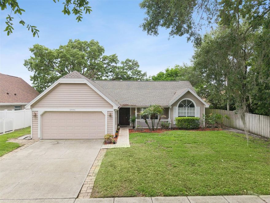 **This house comes with a REDUCED RATE through the seller's preferred lender. This is a lender-paid rate buydown that reduces the buyer's interest rate and monthly payment.**

Welcome to 12406 Harney Dr. in Orlando, a thoughtfully designed 3-bedroom, 2-bath home offering approximately 1,515 square feet of living space and an open floorplan that creates an easy, comfortable flow for everyday living and entertaining. This well-maintained home also features a whole-house tankless water heater for added efficiency and convenience.

Inside, the layout is bright and functional, with connected living, dining, and kitchen areas that make the home feel open and inviting. The design supports both relaxed daily routines and effortless hosting, while the bedroom layout offers a comfortable balance of shared spaces and private retreats. The primary suite provides a peaceful place to unwind, and the additional bedrooms offer flexibility for guests, a home office, or changing household needs.

Step outside to a backyard designed for enjoying Florida living at its best. The screened in-ground pool—resurfaced in 2020 and complemented by new pool equipment installed in 2019—creates a private setting for swimming and lounging. The pool enclosure was rescreened in 2025, enhancing both appearance and functionality, while the surrounding deck offers plenty of room for outdoor seating and entertaining. A covered patio adds even more versatility, giving you a shaded space to relax, dine outdoors, or gather with family and friends throughout the year.

One of the property’s most attractive features is the lake view from the rear of the home, where the pool area overlooks the water and adds a serene natural backdrop to the outdoor living space. The proximity to the body of water enhances the setting with a more open feel and a peaceful atmosphere, making the backyard especially appealing for quiet mornings, sunset relaxation, or hosting with a view.

Additional recent improvements include a new roof installed in 2024, providing peace of mind for years to come.

With its inviting interior, open layout, numerous updates, screened pool, covered patio, and scenic water view, 12406 Harney Dr. offers a wonderful blend of comfort, functionality, and waterfront-inspired outdoor living in Orlando.