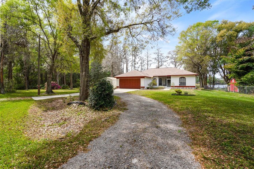 Peaceful Lakefront Home with no HOA or CDD Fees on a Double Lot! Bring all of your toys to this one owner Lakefront Home featuring 3BR/2Bath Split Plan! As soon as you open the front door, you will see a breathtaking view of the Lake right from the Foyer. Moving through the Home, you will find a nice open floor plan with Vaulted Ceilings, a large Living Room and Dining Room right as you walk in. To your right, you will find your two Guest Bedrooms and Guest Bath, moving back through the Living/Dining Room area you will see your nice open Kitchen which features Plant Shelves, Closet Pantry, and room to put a small Breakfast table if you wish. Off of the kitchen you will find your Inside Laundry Room which leads you to your 2 Car attached Garage. Walking back through the kitchen to your left you will walk into your Master Bedroom which is spacious and has a Beautiful view of the Lake to wake up to! Your Master Bath features a nice size Vanity, Walk-In Closet and a step in Shower. Not only will you enjoy sitting on your large Covered and Screened Lanai drinking your morning coffee, you will also be able to enjoy the Beautiful Sunsets over the Lake in the evenings. This Home is very well maintained, and in move in ready condition! Close to Shopping, Restaurants, Schools, Recreation Facilities and much more. Don’t wait on this one as it won’t last long at this price!