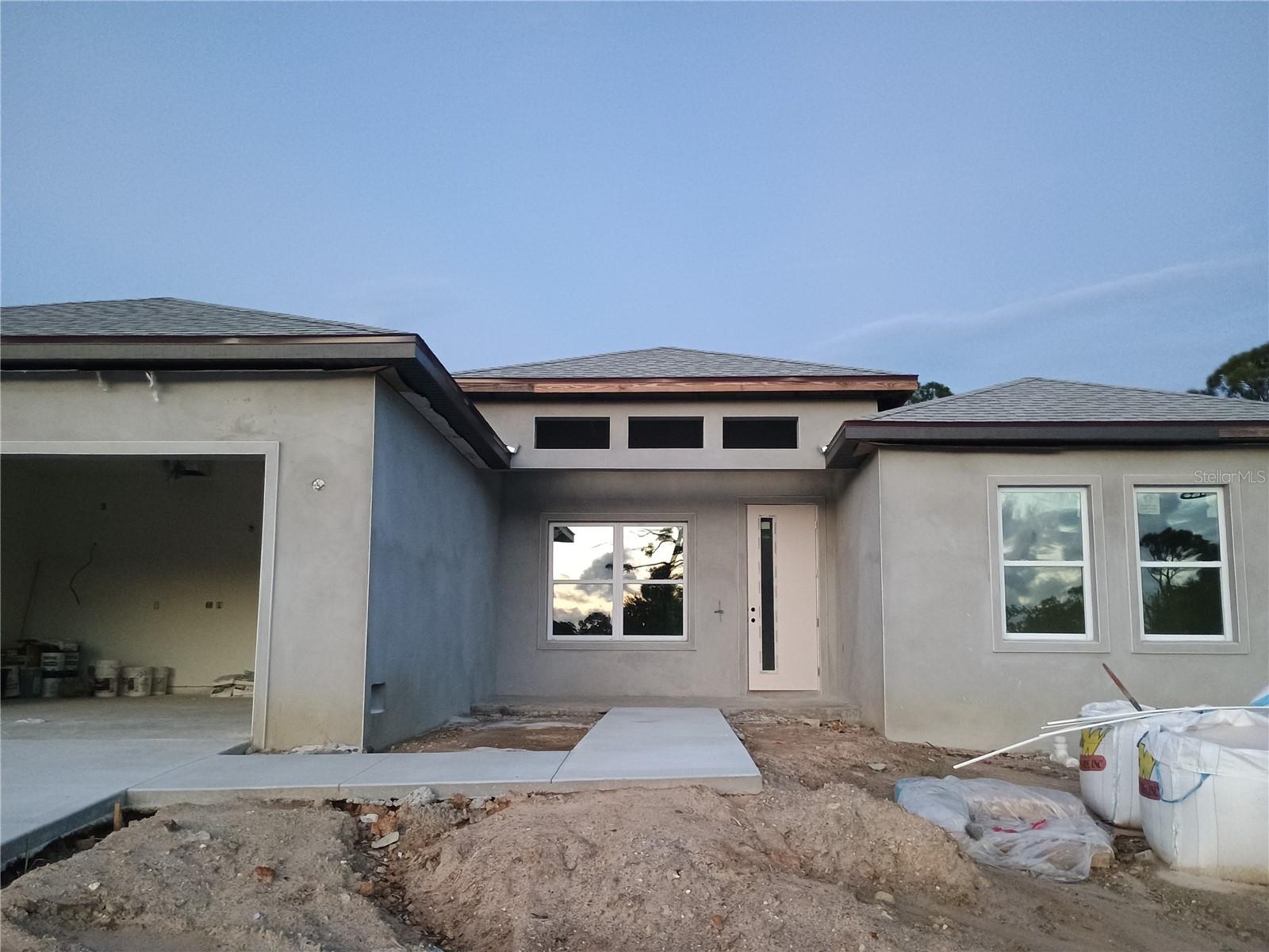 Under Construction. Almost Done! Just in time to add you own touch. Modern Coastal Retreat – Minutes from Boca Grande
Offered below market, this brand-new custom residence delivers elevated coastal living in the heart of Placida, just 10 minutes from Boca Grande and minutes from Coral Creek private airport.
Designed with discerning buyers in mind, this 4-bedroom, 2-bath home pairs architectural simplicity with luxury-grade finishes and a seamless indoor-outdoor flow. Soaring ceilings, an open-concept layout, and curated design details set the tone throughout.
The primary suite offers a spa-inspired shower, walk-in closet, and serene views of the outdoor living space.
Concrete block construction, impact-rated windows, and modern mechanicals deliver lasting value and peace of mind.
Live minutes from the sparkling sand beaches, world-class fishing, and private air access – the Gulf Coast lifestyle at its finest.