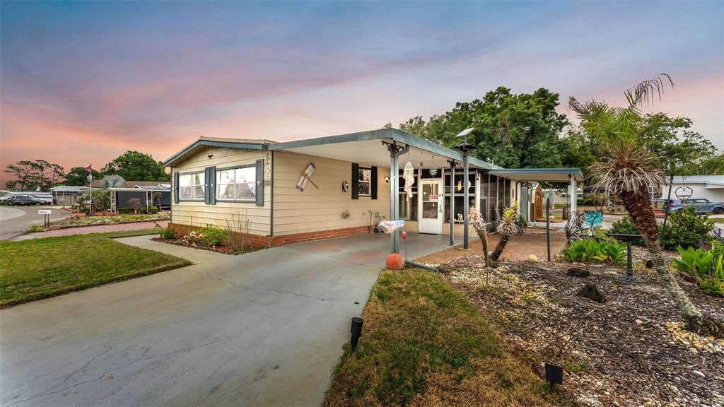 Photo of 12 Woodland Circle, Haines City, FL 33844 (MLS # L4961344)