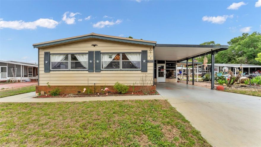 Welcome home to this lovely 2 bedroom, 2 bathroom,  manufactured home that sits on a nice sized corner lot. Sun-Air Country Club is a nice quiet neighborhood with no HOA and no lot rent. You own the land! This home offers a great floor plan, a spacious living room, a dining room with built ins and a well equiped kitchen. Both bedrooms are down the hallway with the 2nd bedroom having its own access to the guest bathroom (furniture included in this room). The primary bedroom is large, boasts a walk in closet and the primary bath has a nice step-in shower. The Florida room has tile flooring and vinyl windows over the screens for year round enjoyment. There is also a large storage/workshop room that has built in cabinets, a workbench, a utility sink and room for a golf cart. There's a additonal 12x14 storage shed on the side of the property and ramp that leads up to the front door. The irrigation system runs off its own well that is only about 6 years old and the water heater is about 3 years old. Lawn equipment- mower, weeder, and generator are also included. Soft spots on floor are due to contractor not laying the new floor down property but WILL be repaired.