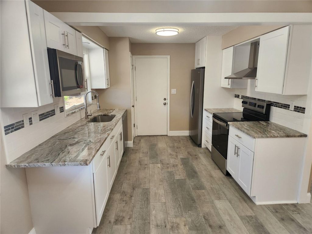 Photo of 4462 Cynthia Lane, Spring Hill, FL 34606 (MLS # TB8468672)