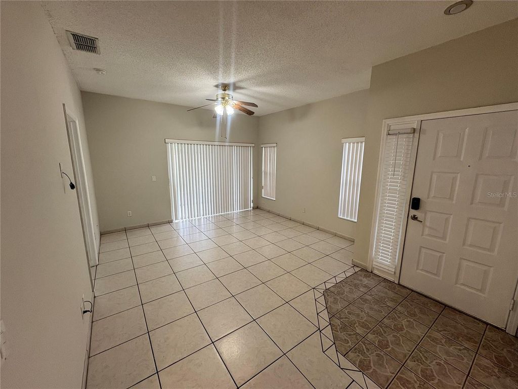Photo of 14556 Laguna Beach Circle, Orlando, FL 32824 (MLS # O6390552)