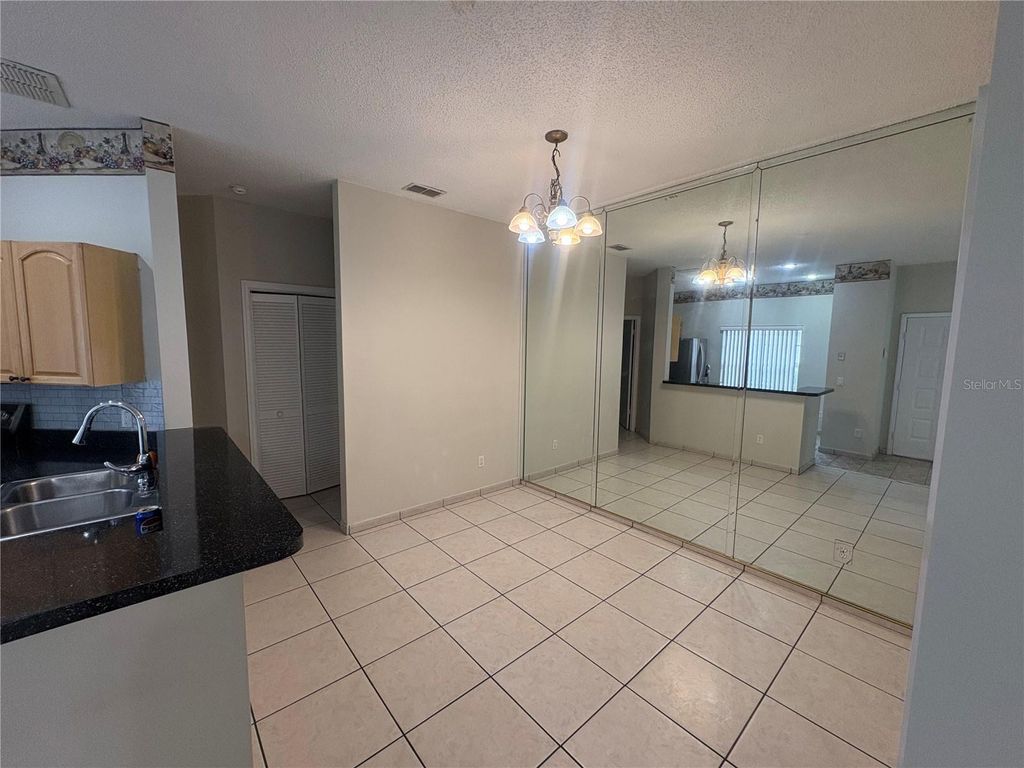 Photo of 14556 Laguna Beach Circle, Orlando, FL 32824 (MLS # O6390552)
