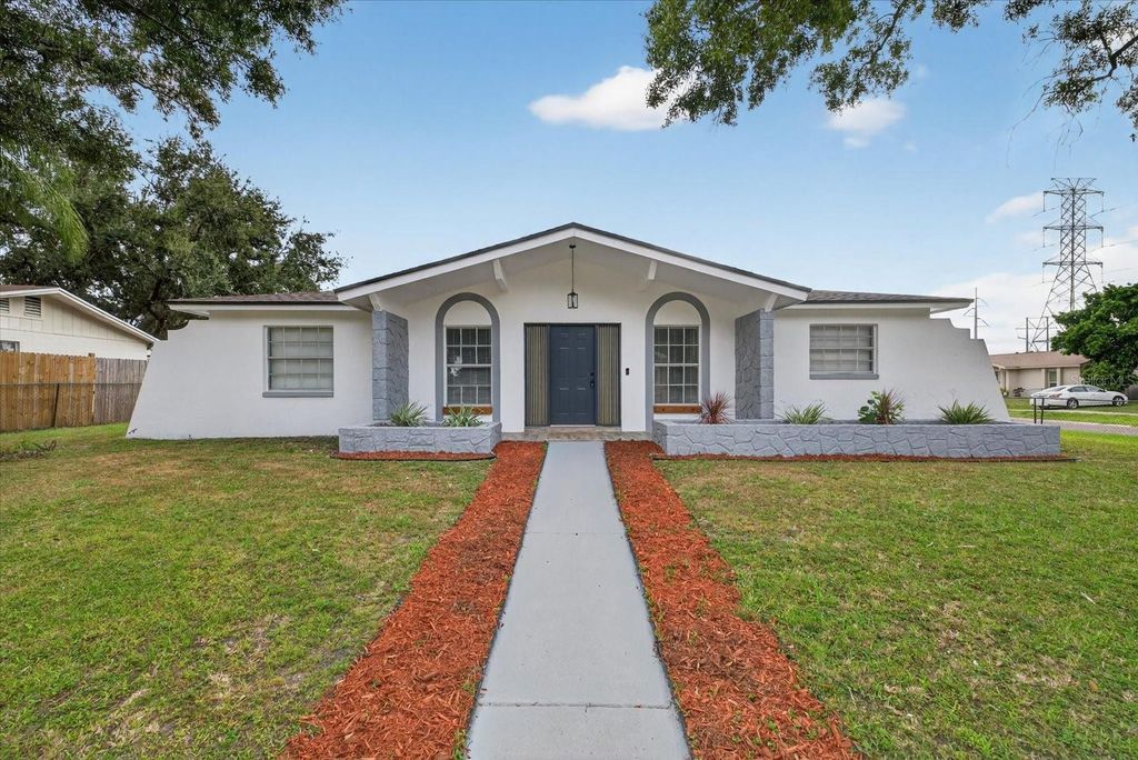 Photo of 8609 Fish Lake Road, Tampa, FL 33619 (MLS # TB8438732)