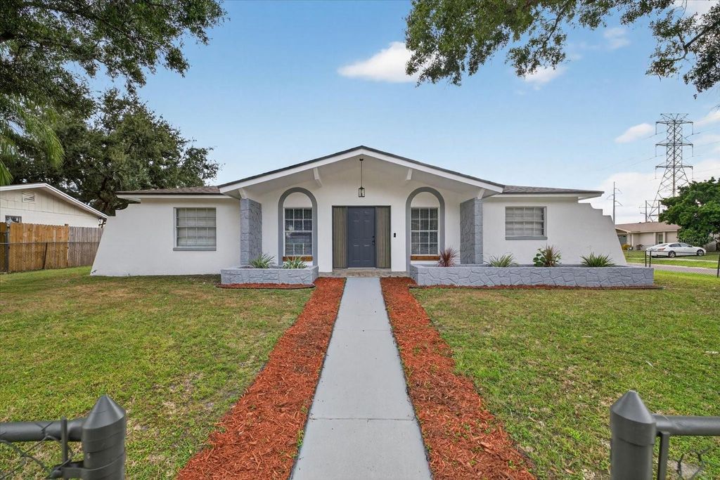 Photo of 8609 Fish Lake Road, Tampa, FL 33619 (MLS # TB8438732)