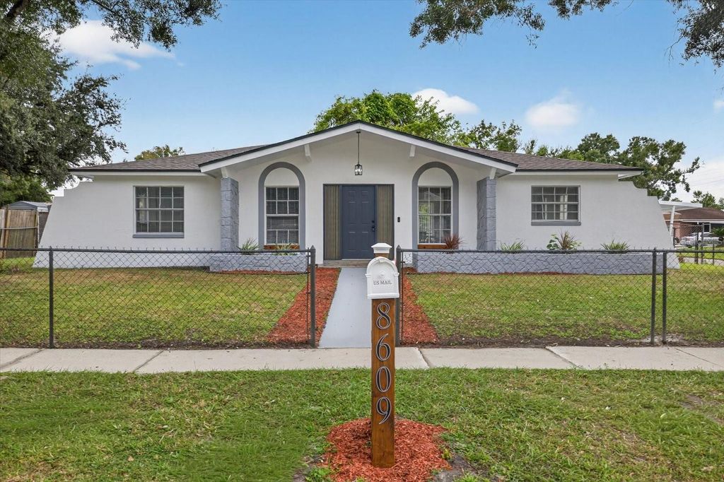 Photo of 8609 Fish Lake Road, Tampa, FL 33619 (MLS # TB8438732)