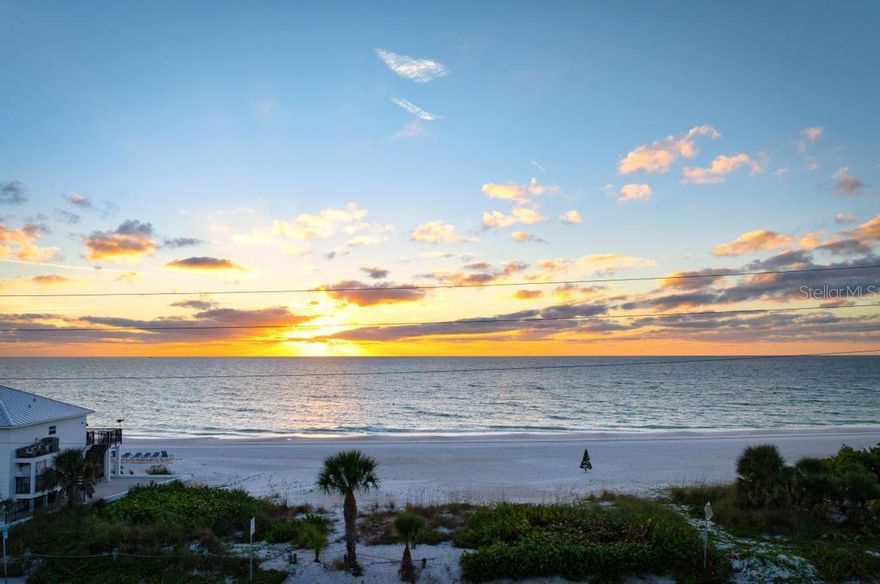 PRICE REDUCTION!!! This is your sign to get out of the cold and come to Florida NOW! New, new, new.... Just Listed! Beachfront Condo with STUNNING GULF VIEWS! Experience the ultimate in coastal living with this beautifully updated kitchen with quartz countertops, NEW half bath, NEW roof, NEW elevator, and a refreshed pool (all new pool heaters, pumps, etc.), spa, deck and bathhouse. Every detail has been updated for comfort, style, and peace of mind. From the moment you enter this freshly painted condo you will be captivated by the uninterrupted, direct Gulf views and the sparkling waters of the Gulf of Mexico which are front and center. Enjoy breathtaking sunsets from your open-concept great room and kitchen, and start your mornings with peaceful sunrises from the bayfront heated pool, hot tub, or fishing/boat dock. This elevated BEACH-TO-BAY community is a hidden gem, known for its quiet ambiance and friendly, long-term residents. The deeded beachfront property, owned by the association, ensures your panoramic views will never be obstructed. Even better, this 3rd story unit remained high and dry through the most recent hurricanes, offering extra peace of mind. Inside, the condo features vaulted ceilings, new luxury vinyl plank flooring, and an enclosed lanai that opens to the soothing sound of waves. The two spacious bedrooms provide flexibility as one currently serves as an office and workout space. Safety, maintenance and financial stability are a hallmark of this community. Summer Sands reserves are fully funded and the building easily passed the Florida Milestone Inspection required by the State to verify structural integrity. Located just a short walk from Bridge Street's shopping, dining, and nightlife, and steps from the free Island Trolley, this home includes two under-building parking spaces with secure elevator and stairwell access. The pool complex also has a patio with a grill and picnic table as well as new kayak/paddleboard storage. The all-new landscaping of the entire property has been professionally designed, including the lush and peaceful atrium. This is your chance to own a condo with the very best of Anna Maria island living.