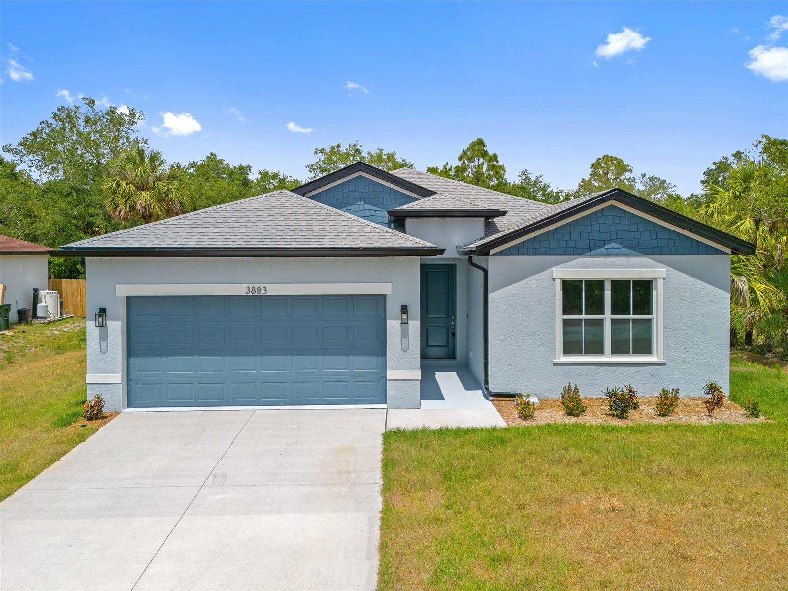 NEW CONSTRUCTION! BUILDER INCENTIVE AVAILABLE! FURNISHED MODEL LOCATED AT 4131 BULA LN - SCHEDULE THROUGH SHOWINGTIME. GREAT INVESTMENT OPPORTUNITY OR PERMANENT RESIDENCE! SPACIOUS 4 BEDROOM, 3 BATH, 2-CAR GARAGE HOME IN NORTH PORT! Spacious open floor plan features 1,990 sf of living space, 9’ 4” ceilings, 8’ doors and luxury vinyl plank flooring throughout. Well-appointed kitchen offers quartz countertops, tile backsplash, Samsung stainless appliances, closet pantry and center island with breakfast bar overlooking dining area with slider to lanai. Primary suite features tray ceiling, his and hers walk-in closets and private bath with dual sinks and walk-in shower. Split floor plan provides privacy for all with 2 nicely sized guest bedrooms with separate full bath plus the 4th bedroom includes private full bath. Additional notable features include tiled showers, covered lanai with southern exposure, hurricane impact windows, irrigation system and nicely landscaped exterior. No HOA fees, CDD and not in a flood zone. Plenty of room for a pool. Great location close to Murdock restaurant and shopping district, schools, beautiful parks, golf and just a short drive to Charlotte Harbor, downtown historic Punta Gorda with world-class fishing and boating, community events and entertainment and easy access to gulf beaches. Don’t miss this opportunity! Schedule your private showing today! Photos are of a similar completed home, finishes may vary. Floor plan may be reversed from the attached plan. BUILDER HAS OTHER LOCATIONS AVAILABLE!