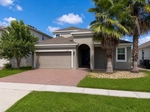 Photo of 2240 Rush Bay Way, Orlando, FL 32824 (MLS # O6433853)