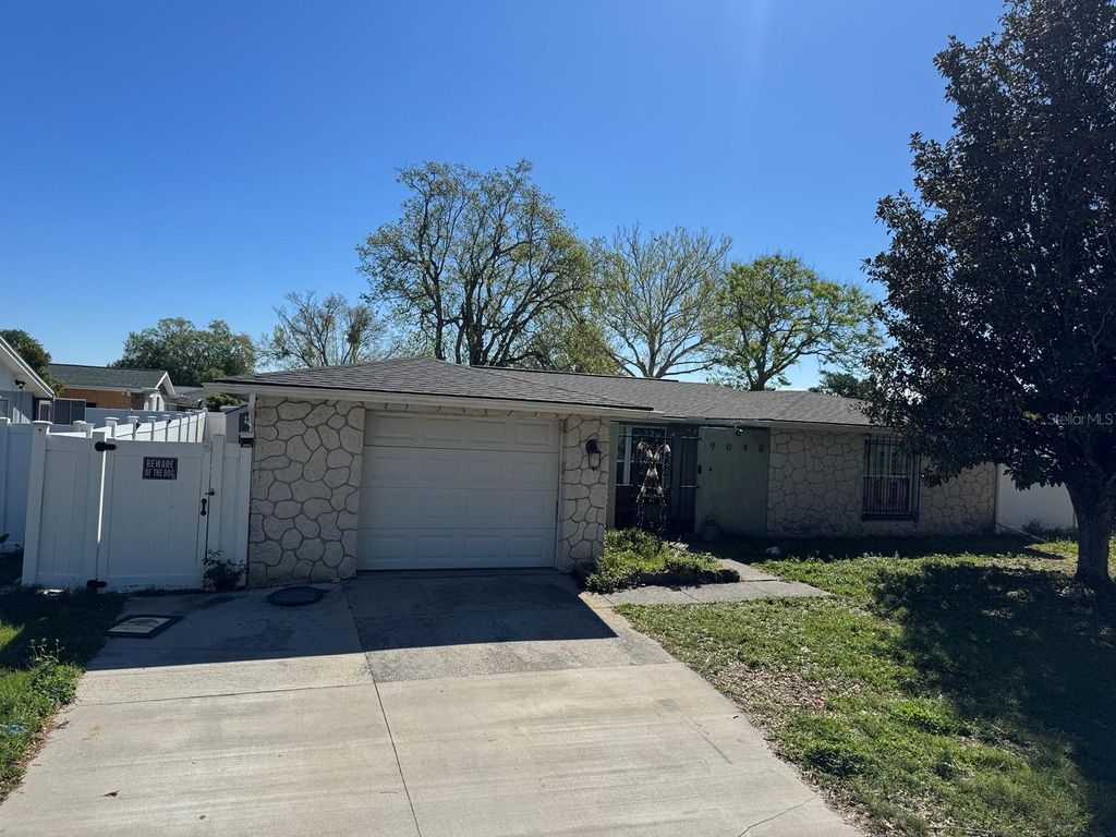 Photo of 9040 Crabtree Lane, Port Richey, FL 34668 (MLS # TB8488754)