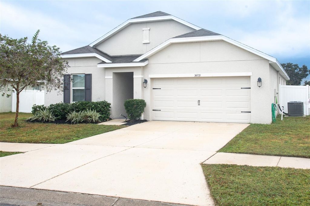 Photo of 36721 Goffaux Loop, Zephyrhills, FL 33541 (MLS # TB8447672)