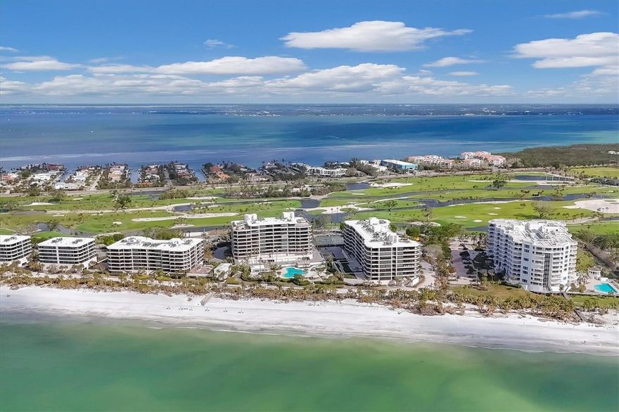 Discover the pinnacle of coastal luxury in this magnificent 8th-floor northeast corner residence, perfectly positioned within one of Longboat Key’s most sought-after communities. Revel in sweeping, unobstructed views of the Gulf of Mexico, Sarasota Bay, Downtown Sarasota, the
Longboat Key golf course and beyond. With a generous 2,375-square-foot floor plan, this exquisitely appointed home offers two spacious bedrooms, a convertible den/third bedroom and two-and-a-half baths. Every detail of this residence exudes sophistication. The turnkey-furnished interior features soaring ceilings, gleaming marble floors and a light-filled kitchen with an island centerpiece designed for functionality and elegance. The kitchen, equipped with Bosch and Sub-Zero appliances, ample storage and an inviting dining nook, seamlessly blends modern convenience with timeless style. Floor-to-ceiling glass sliders frame the panoramic vistas, while wraparound terraces provide the ultimate setting for sunrise coffee or evening cocktails. Nestled behind the gates of the exclusive Longboat Key Club, The Sanctuary offers a resort lifestyle unmatched in its amenities and beauty. The community boasts 1,200 feet of pristine white sand beach, a heated Gulf-side swimming pool with a 25-meter lap area, an outdoor whirlpool spa and a charming beachfront gazebo. Two lighted Har-Tru tennis courts and a state-of-the-art fitness center provide endless recreation opportunities, while saunas and an entertainment room ensure relaxation and social enjoyment. On-site management, 24-hour security and meticulously maintained grounds enhance the sense of exclusivity and convenience. The community also offers private boardwalk access to the beach, allowing residents to enjoy Longboat Key’s serene shoreline just steps from their door. Whether indulging in the luxurious amenities, soaking in the unparalleled views or entertaining guests in your stunning corner residence, life at The Sanctuary redefines coastal elegance. Come and experience why this extraordinary residence is the ultimate address on Longboat Key.
