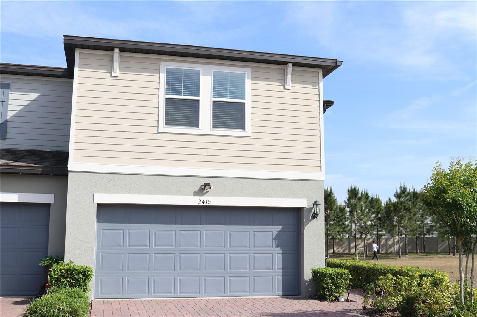 Welcome to Sweet Viburnum Way — a stunning 3-bedroom, 2.5-bath townhome perfectly situated in the heart of Ocoee.
From the moment you step inside, you're greeted by a bright and open layout where the spacious kitchen seamlessly flows into the living and dining areas—ideal for both everyday living and entertaining. Natural light floods the home through large windows and a sliding glass door, which opens to your private back patio, creating an inviting indoor-outdoor experience.
The kitchen is a chef’s delight, featuring a complete suite of stainless steel appliances—including a refrigerator, range, microwave, and dishwasher—along with ample cabinetry and generous countertop space for meal prep and storage.
Conveniently located off the main living space is a guest half-bathroom, perfect for visitors. Upstairs, you’ll find a thoughtfully designed split-bedroom floor plan. The primary suite offers a spacious walk-in closet and a luxurious en-suite bathroom with dual sinks and a glass-enclosed walk-in shower for a spa-like feel.
Two additional bedrooms are generously sized and connected by a stylish Jack and Jill bathroom with a tub/shower combination—ideal for family, guests, or a home office setup. A dedicated upstairs laundry area with full-size washer and dryer hookups adds everyday convenience.
Complete with a two-car garage and nestled in a sought-after community, this beautifully maintained home offers the perfect blend of comfort, style, and functionality.
Don’t miss your chance to call this home—schedule your showing today. This gem won’t last long!