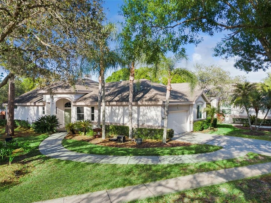 Located in the desirable Glencliff neighborhood of Westchase, this move-in ready home features smart-home upgrades including a video doorbell, smart thermostat, smart garage door opener, and an automated in-ground hot tub with heater and LED lighting. The home offers 3 bedrooms, 2 bathrooms, and an office/bonus room. Triple sliding glass doors open to a screened patio overlooking the golf course and the large automated hot tub. The kitchen includes light cabinetry, granite countertops, an 8" island, gas range, and four-panel refrigerator. Interior features include 20x20 tile, new gray laminate in the primary bedroom, and carpet in bedrooms 2 and 3. The primary suite offers dual walk-in closets with built-ins, and a double-sided gas fireplace warms both the living and great rooms. Major updates include a 2015 roof, 2019 AC, and 11 windows replaced in 2021. Glencliff HOA provides weekly lawn service and exterior painting every 6 years (last painted in 2024). Westchase amenities include community pools, tennis courts, parks, and trails, with Glencliff Park directly across the street offering a playground, basketball courts, and walking paths. Conveniently located near shops and dining.