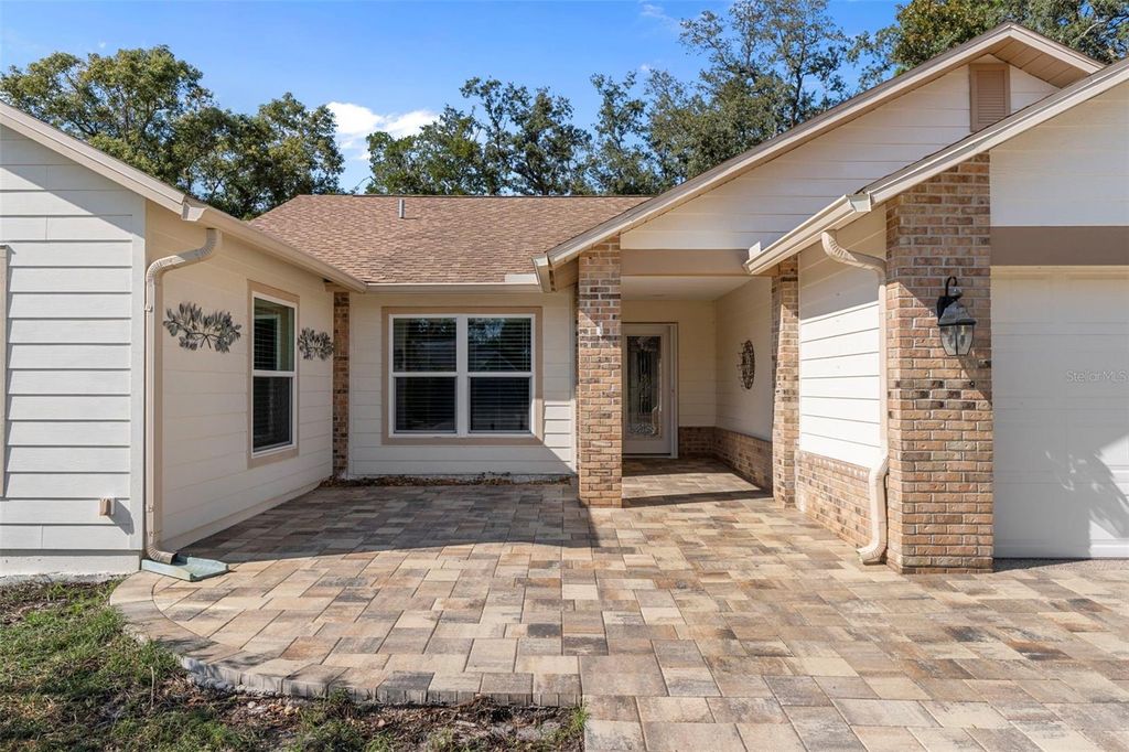 Photo of 3015 Saw Mill Lane, Spring Hill, FL 34606 (MLS # W7880897)