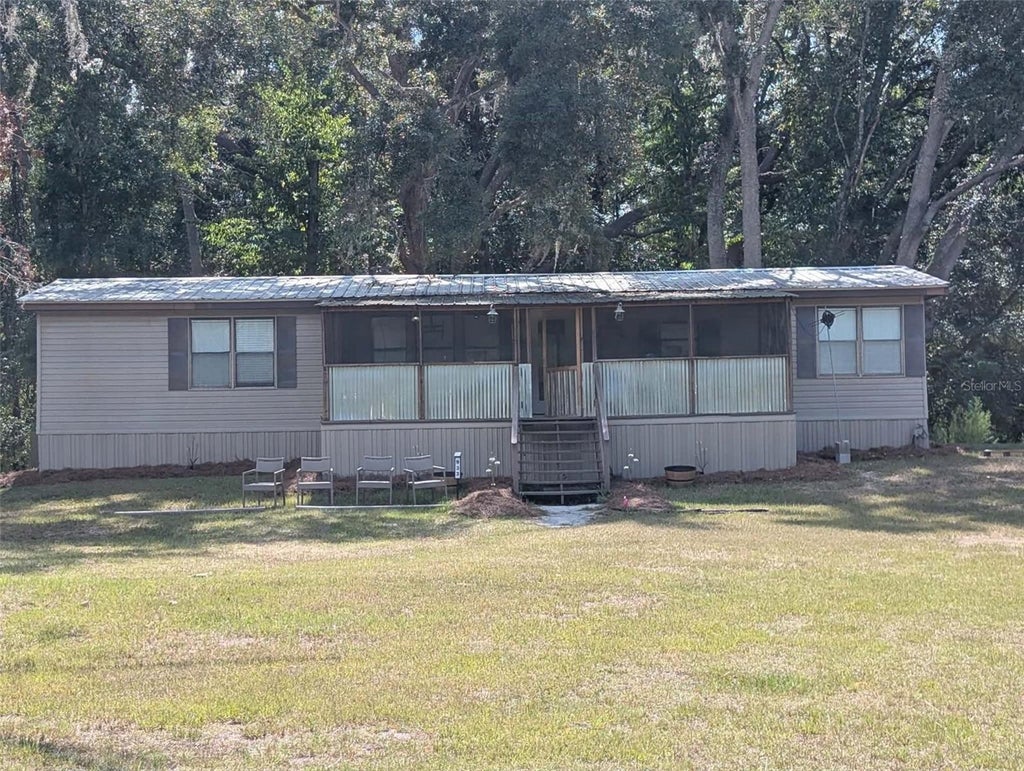 Photo of 933 NE Fir St, Pinetta, FL 32350 (MLS # S5153619)