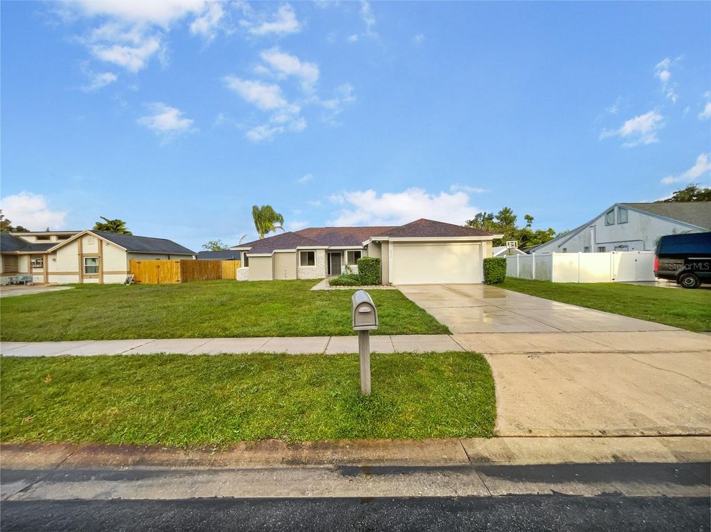 Photo of 2315 Hidden Lake Street, Kissimmee, FL 34741 (MLS # O6350189)