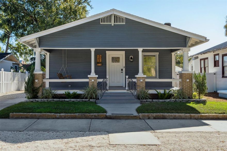 One or more photo(s) has been virtually staged. Beautiful 1920s Bungalow in the Heights!  Nestled in the heart of Tampa Heights, this charming 3-bedroom 2-bath is located just minutes away from Armature Works (.07 of a mile), The Riverwalk, and many other desirable downtown Tampa attractions. You'll be greeted with a classic front porch, swing, and relaxing atmosphere.  The open floor concept, fenced backyard, and storage shed makes it great for hosting. This home features wonderful wood flooring and tile, an updated kitchen with stainless steel appliances, backsplash, newer cabinets, tiled floor, quartz countertops, an island range hood, and newer light fixtures. The master suite comes with a larger than normal closet for bungalows and has its own ensuite private bathroom, with plenty of extra storage. The laundry area is inside and located in the rear of the home for ultimate convenience.  Use the 3rd bedroom as an office or traditional bedroom!  Enjoy year-round evening entertaining in the privacy of your fenced-in yard with a large shed for storage. Enjoy a NEWER ROOF (19'), upgraded windows (20' & 21'), NEW HVAC system (25'), NEW attic insulation (25'), and NEW interior paint (25') in this home.  Utilize the efficient gas stove and dryer in this home too. Washer and Dryer are included in the sale. Walk to nearby Plymouth Park and playground, Duran, and Freedom parks!  This home location offers easy access to many points central to downtown Tampa.  Enjoy the Heights, downtown, Channelside, Water Street, SOHO, Ybor City/Gasworx, Midtown, and much more.  The nearby Riverwalk expansion is quickly becoming part of this wonderful area too!  Come see this great Bungalow today!