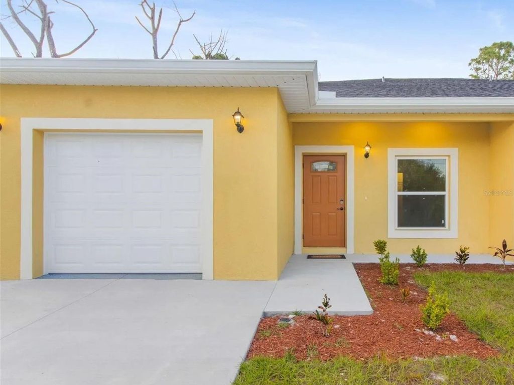 Photo of 11974 Tetzel Avenue, Port Charlotte, FL 33981 (MLS # D6145223)