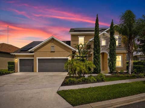 Photo of 14216 Lambert Bridge Lane, Lithia, FL 33547 (MLS # O6430108)