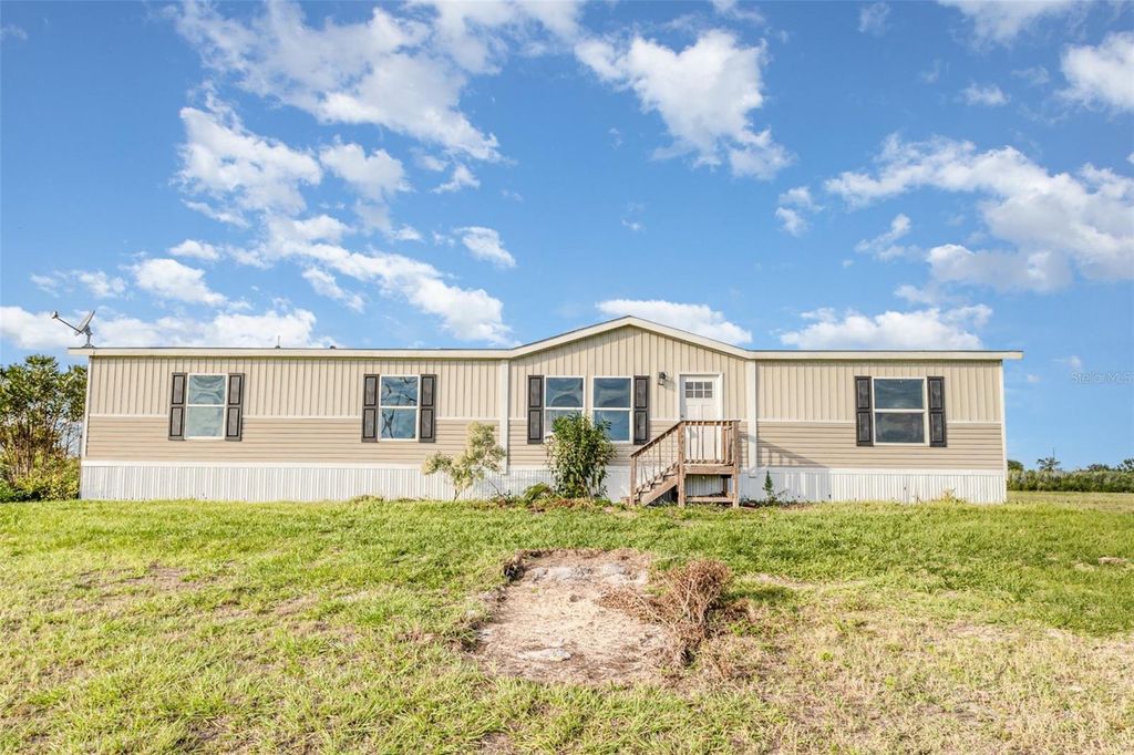 Photo of 16423 NW 262nd Street, Okeechobee, FL 34972 (MLS # TB8442858)
