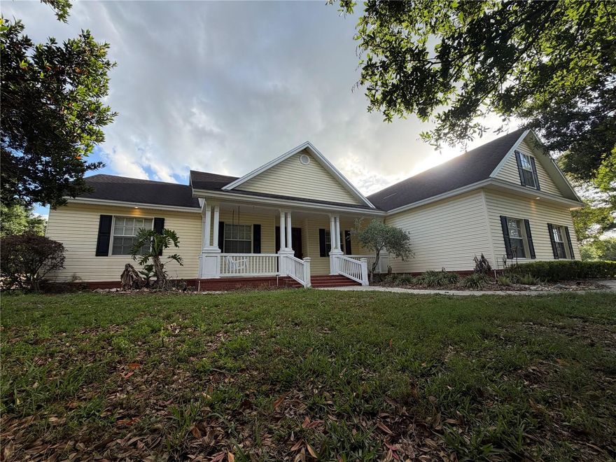 Beautiful home located in Polk City FL in the Sandy Pointe area of Polk County. This home features quality throughout , 4 bedrooms plus office, 2 bathrooms, great room concept, fireplace, eat in kitchen with morning bar and table dining in addition to formal dining. There is a double/triple split bedroom plan based on your lifestyle. Oversized laundry with sink, oversized garage, sound system, walk-in closets everywhere, side entry garage with workshop space, large screened lanai and all situated on approximately 1/2 acre with private lake access to Lake Agnes right across the street.