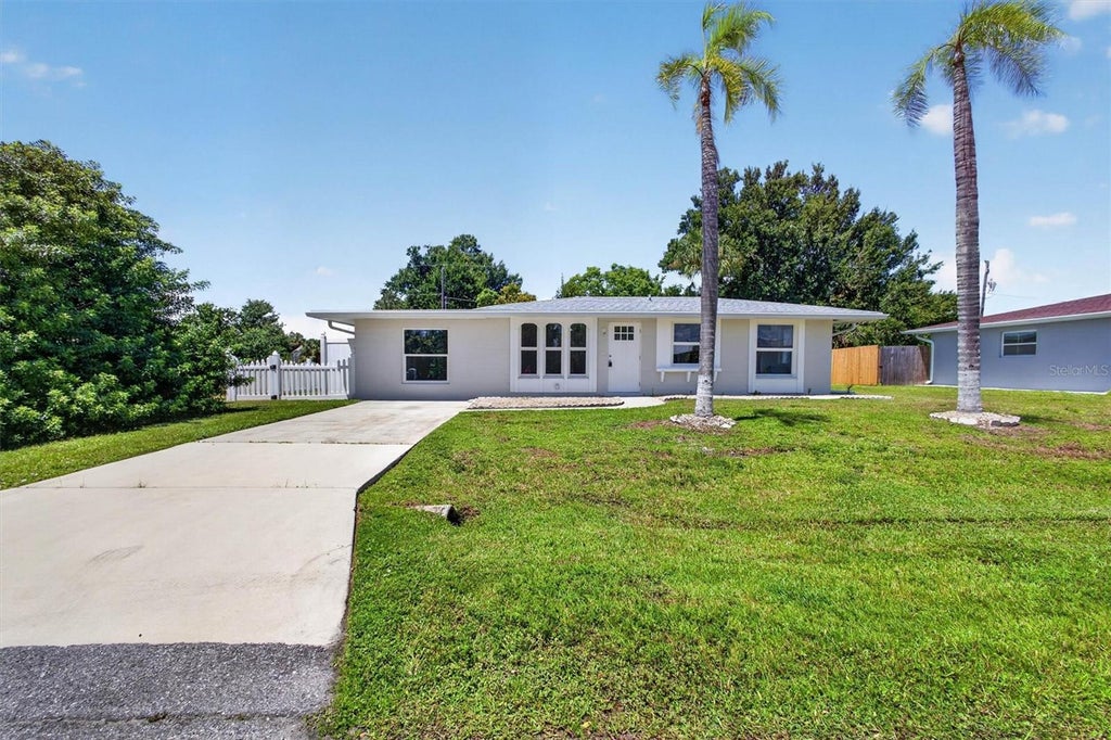 Photo of 312 Reading Street NW, Port Charlotte, FL 33952 (MLS # A4704491)