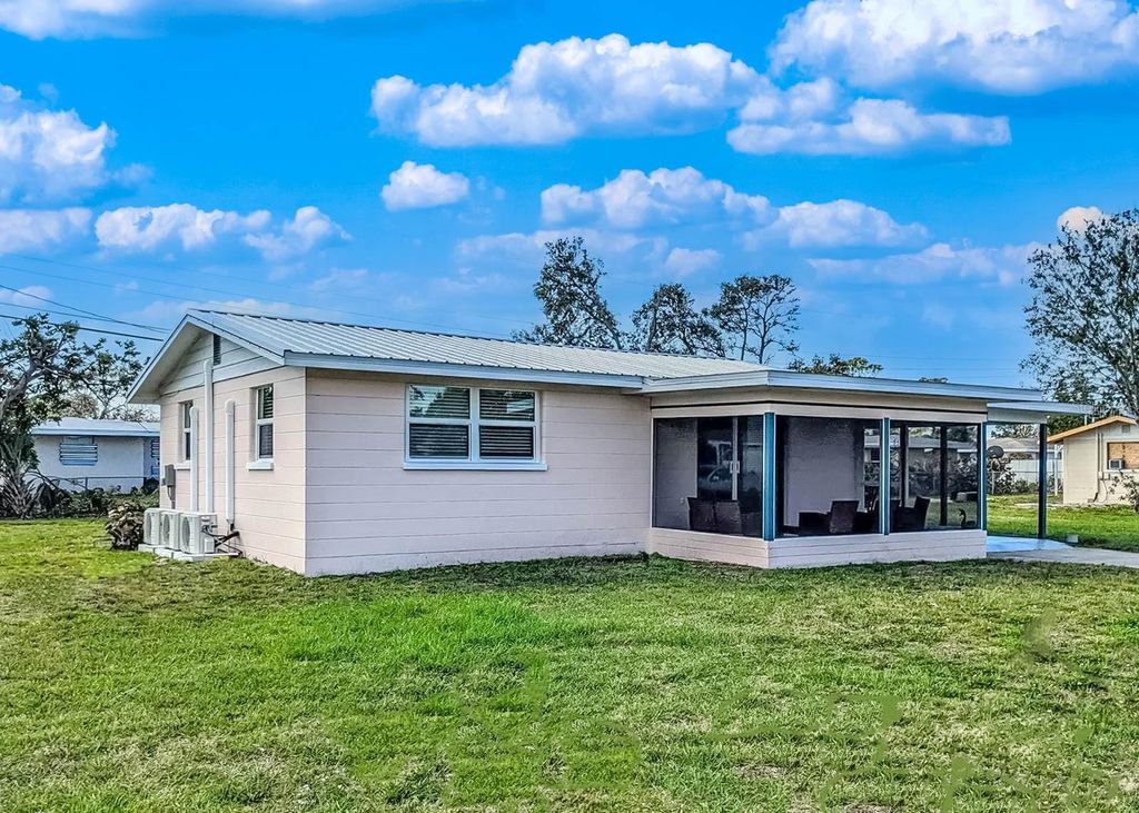 Photo of 191 E Wentworth Street, Englewood, FL 34223 (MLS # A4687765)