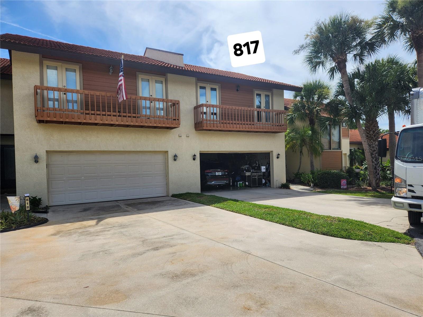 West of the Trail! Live minutes to the beach or use as a rental. This spacious condo has an open floor plan and very high ceilings with the primary bedroom on the first floor and 2 bedrooms on the 2nd floor. The master bedroom features a large master bath that includes a jetted tub, a walk-in shower, dual vanities, and a separate room for the commode. There are 3 sets of sliders providing access to the screened lanai—one in the master, one in the living room, and another in the dining area—perfect for enjoying morning coffee or an evening cocktail.
A half bath is conveniently located on the first floor for guests, while an upstairs full bath with a tub/shower serves the two bedrooms on the second floor. All bedrooms can accommodate a king-size bed, and one of the upstairs bedrooms features a walk-in closet and both have French doors leading to an outside balcony. The garage offers space for storing beach chairs, an ebike, and kayaks, keeping everything sheltered from the weather.
This home provides ample closet space, which is often a rare find in condos. The kitchen is phenomenal, showcasing recessed lighting, plenty of counter space, and cabinets with under-cabinet lighting. Stainless steel appliances, including a refrigerator and dishwasher, are relatively new at 3 years old. There’s also a pantry cabinet, and additional storage space is available under the stairs.
The dining room is graced with a lovely chandelier and is open to both the kitchen and living room, enhancing the spacious feel. The owner is leaving behind a washer and dryer that are about 5 years old. You'll be pleasantly surprised by the amount of space in this townhouse. It does need some touch-up TLC, mostly cleaning and paint. The same tile flows from the entry through the living room, dining room, and kitchen, while carpeting is present in the bedrooms, on the stairs, and upstairs.