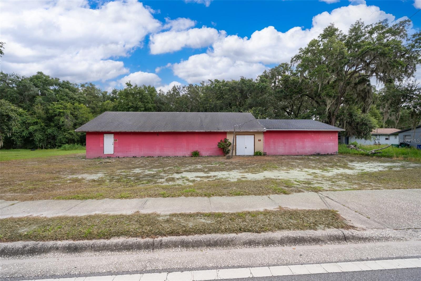 Come check out this BLANK CANVAS! Great opportunity! Property was going to be used as a church. Resting on almost HALF AN ACRE! Awesome lot size. Perfect amount of parking space! Bring your imagination!