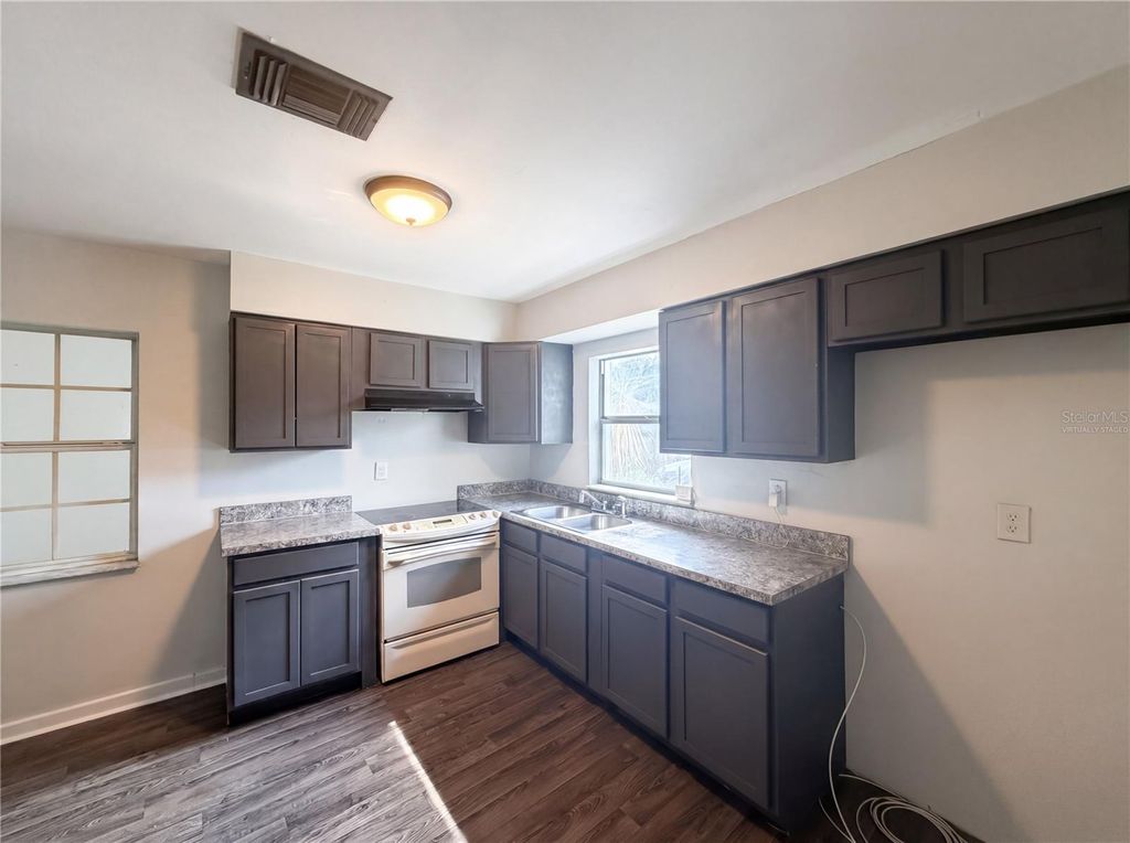 Photo of 1100 Carefree Cove Drive, Winter Haven, FL 33881 (MLS # O6407265)