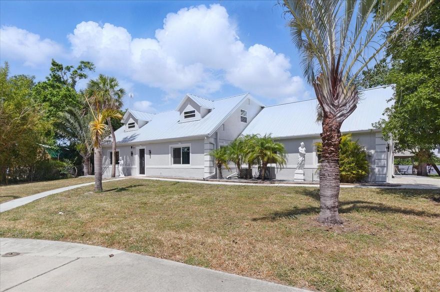 Nestled along the tranquil banks of the Peace River, this exceptional property offers a haven of waterfront living at its finest. Boasting an impressive 300 feet of water frontage, it presents an ideal setting for boating enthusiasts, complete with the perfect spot for installing a boat lift.

Stepping onto the grounds, you're greeted by a charming shed and gazebo, both strategically placed to provide sweeping views of the serene waters. As the sun rises, casting a warm glow over the landscape, the beauty of this natural oasis truly comes to life.

The heart of this retreat is the impeccably designed turnkey home, where every detail has been carefully considered to blend luxury with comfort. Enter to find an inviting space adorned with beautiful tile flooring on the first floor, creating an atmosphere of elegance and warmth.

The kitchen, equipped with stainless steel appliances, beckons to aspiring chefs, while the adjacent dining area offers the perfect spot to savor meals with loved ones.

On the first floor, the master bedroom awaits, boasting its own ensuite bathroom for added convenience and privacy. Upstairs, a balcony provides a picturesque vantage point overlooking the Peace River, offering a tranquil retreat to unwind and take in the breathtaking views.

With four additional bedrooms and two bathrooms upstairs, including one ensuite, there's ample space to accommodate family and guests in comfort. A cozy sitting room adds to the allure, providing a welcoming space to relax and reconnect.

Outside, a long driveway ensures privacy and seclusion, while the expansive nearly acre-sized lot offers endless possibilities for outdoor enjoyment. Whether you're soaking in the hot tub under the starlit sky or simply enjoying the peaceful ambiance of waterfront living, this property promises a lifestyle of unparalleled tranquility and luxury.